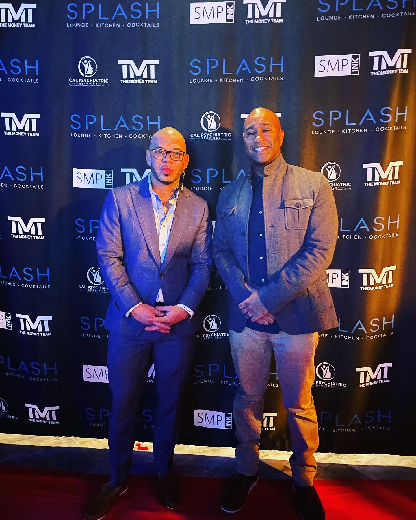 Paki Phillips with a guest at a venue opening