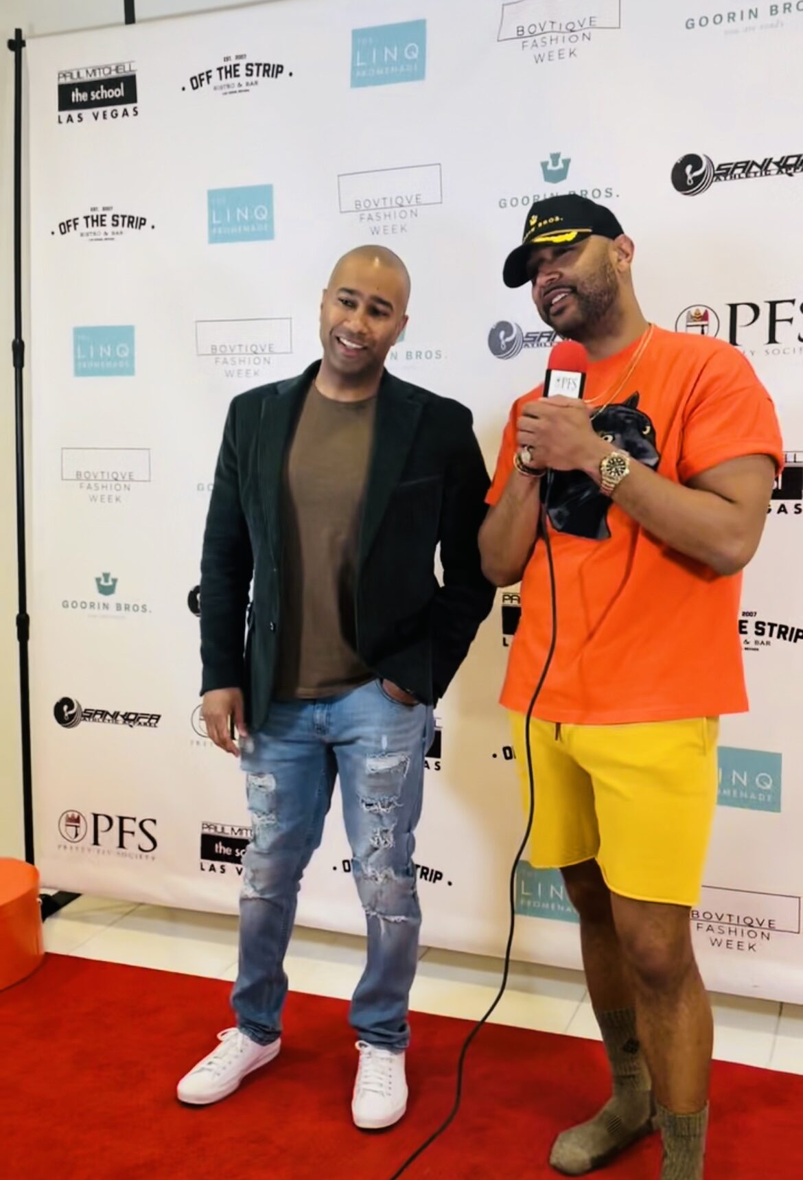 Paki Phillips with a guest at a fashion event
