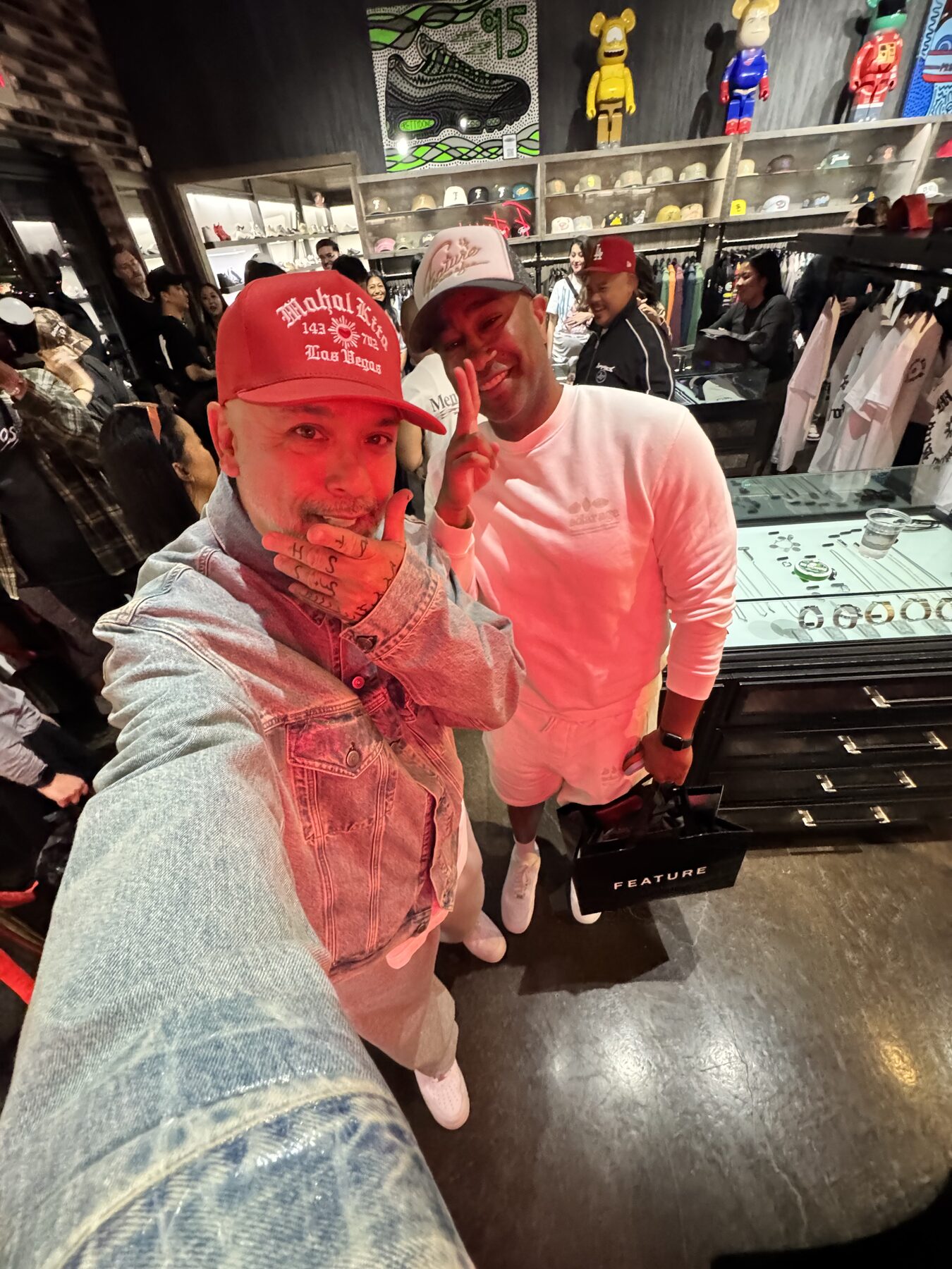Paki Phillips greeting a guest at a retail event