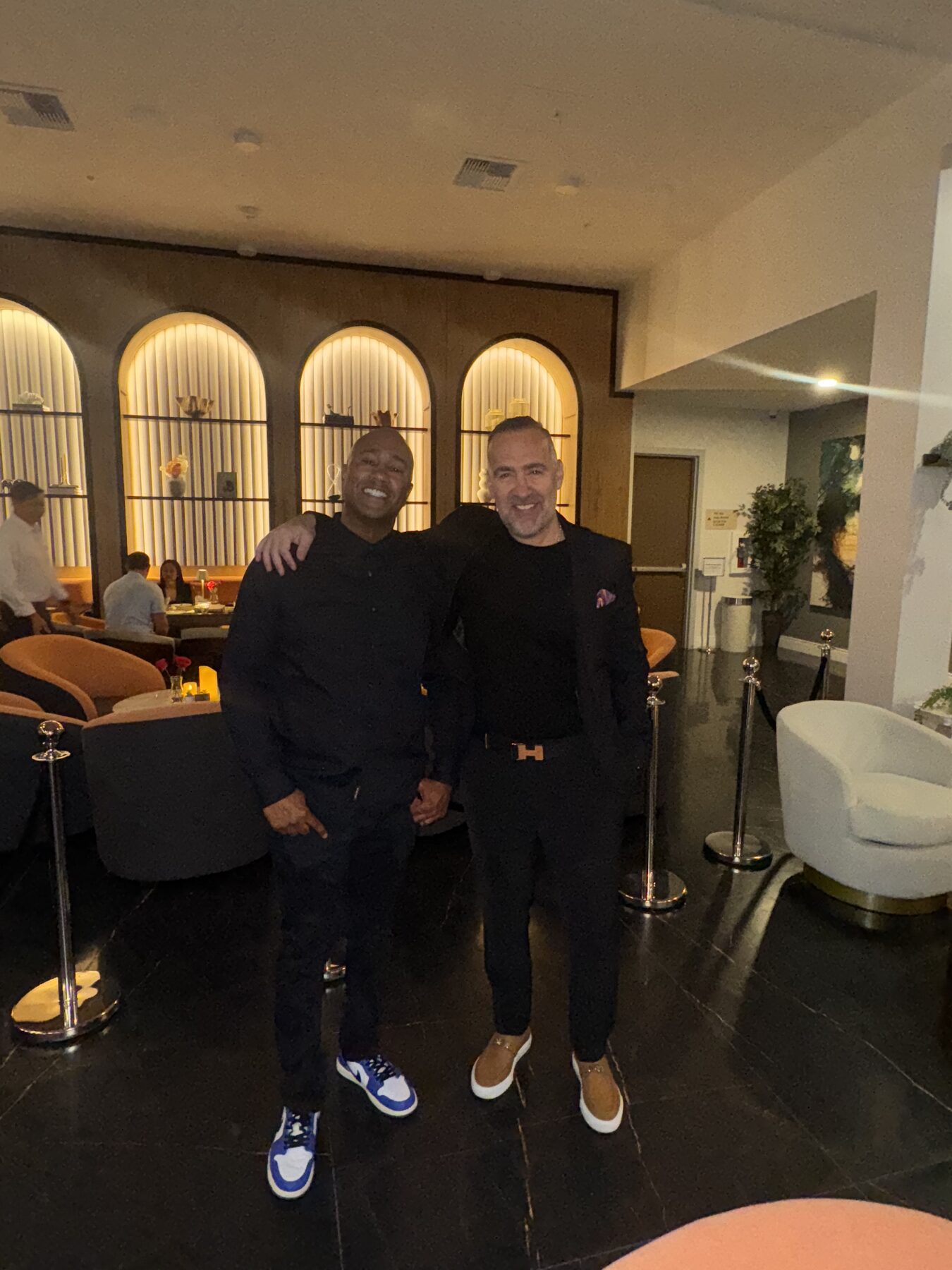 Paki Phillips with a guest in a music studio