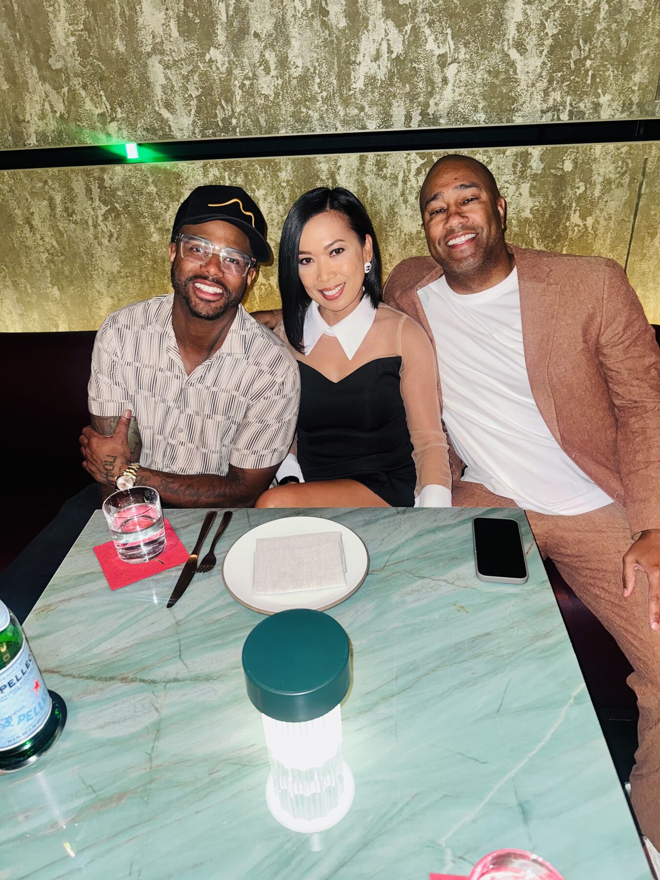 Paki Phillips with friends at a steakhouse