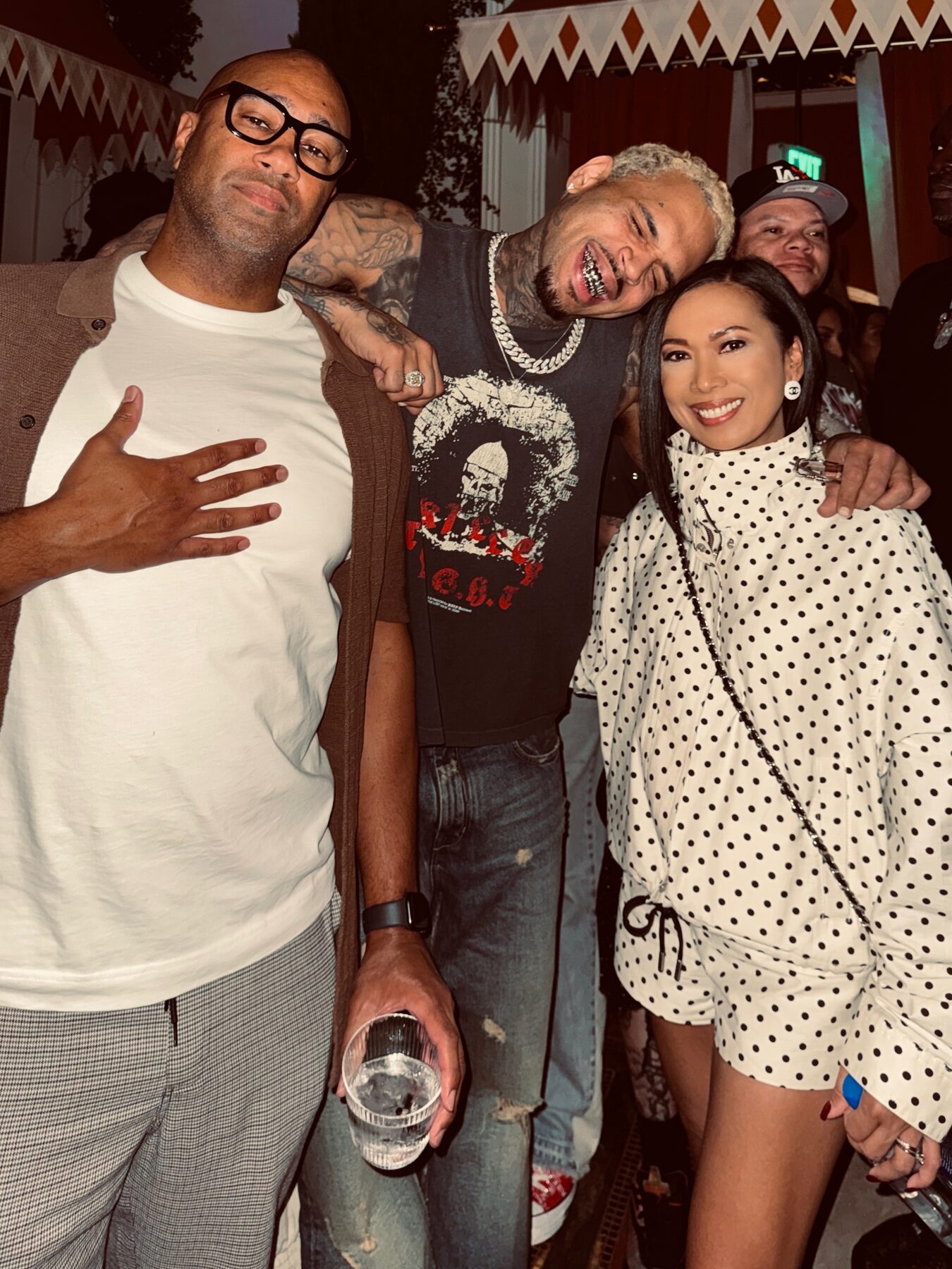 Paki Phillips with friends at a nightlife event