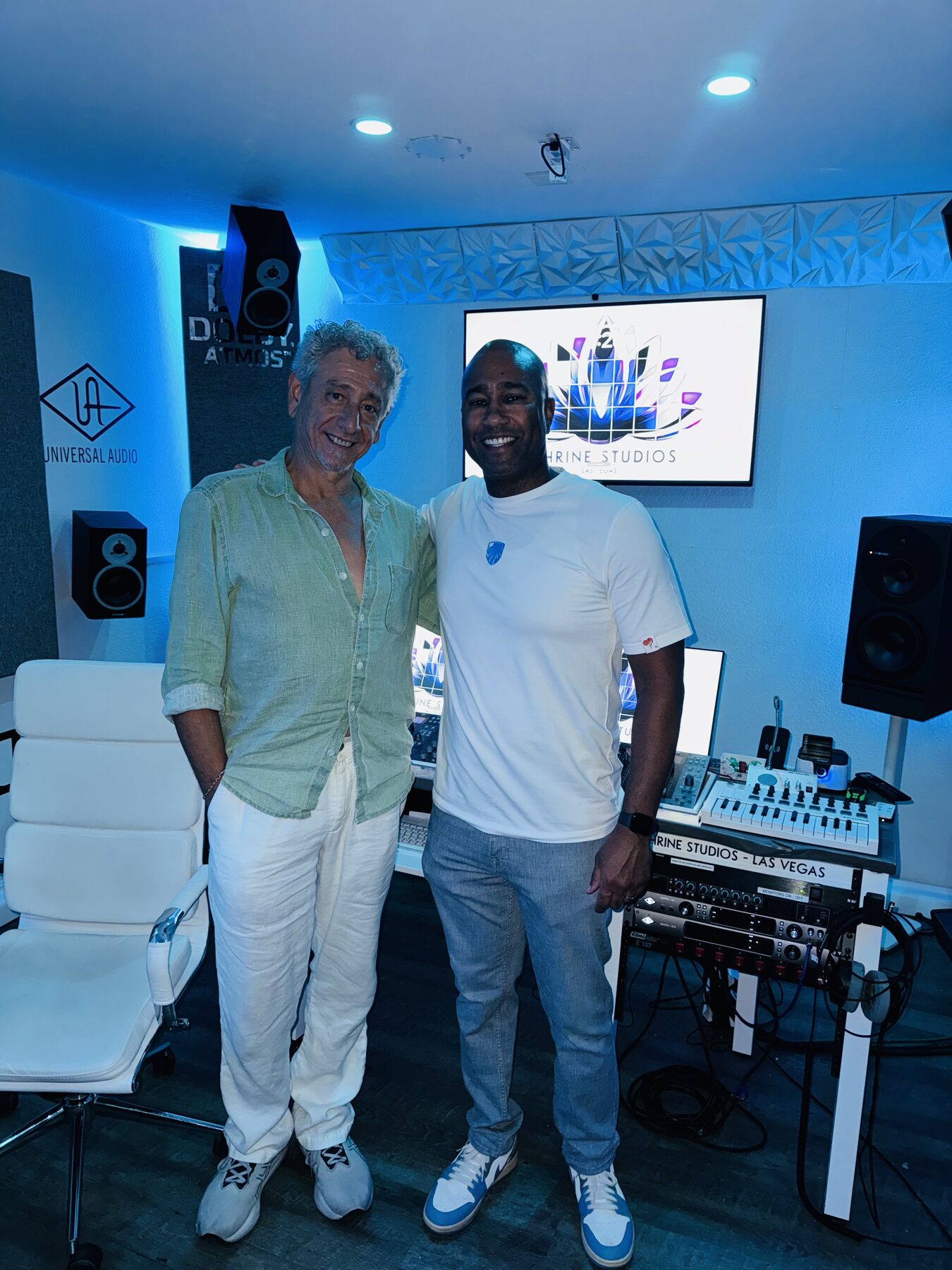 Paki Phillips with a guest in a recording studio