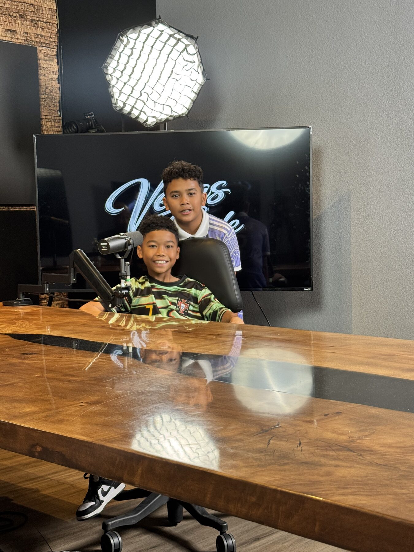 Paki Phillips and his sons at the Vegas Circle podcast table